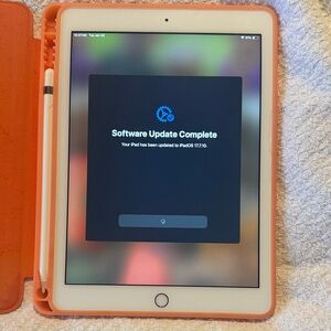Apple iPad 6th gen with pencil and Orange Cover